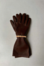 AV Jewels Peach bellini bracelet on brown aesthetic glove
