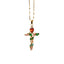 Gold cross necklace with colored gemstones on a white background
