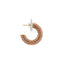 Gold earring with pink gemstones on a light gray background